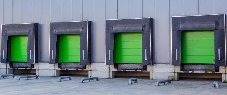 green docking warehouse trucks