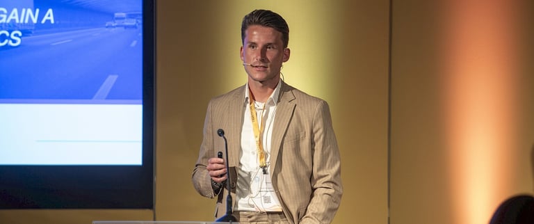 man presenting in suit